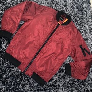 Red Bomber jacket.